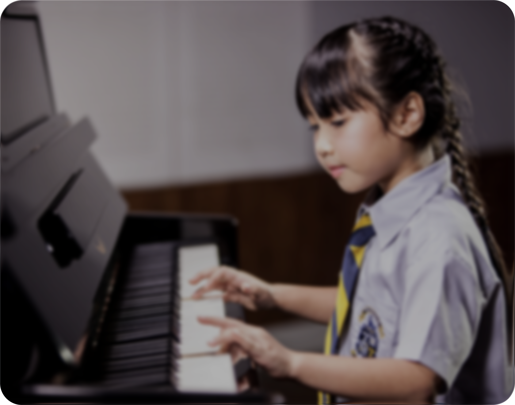 Student playing piano